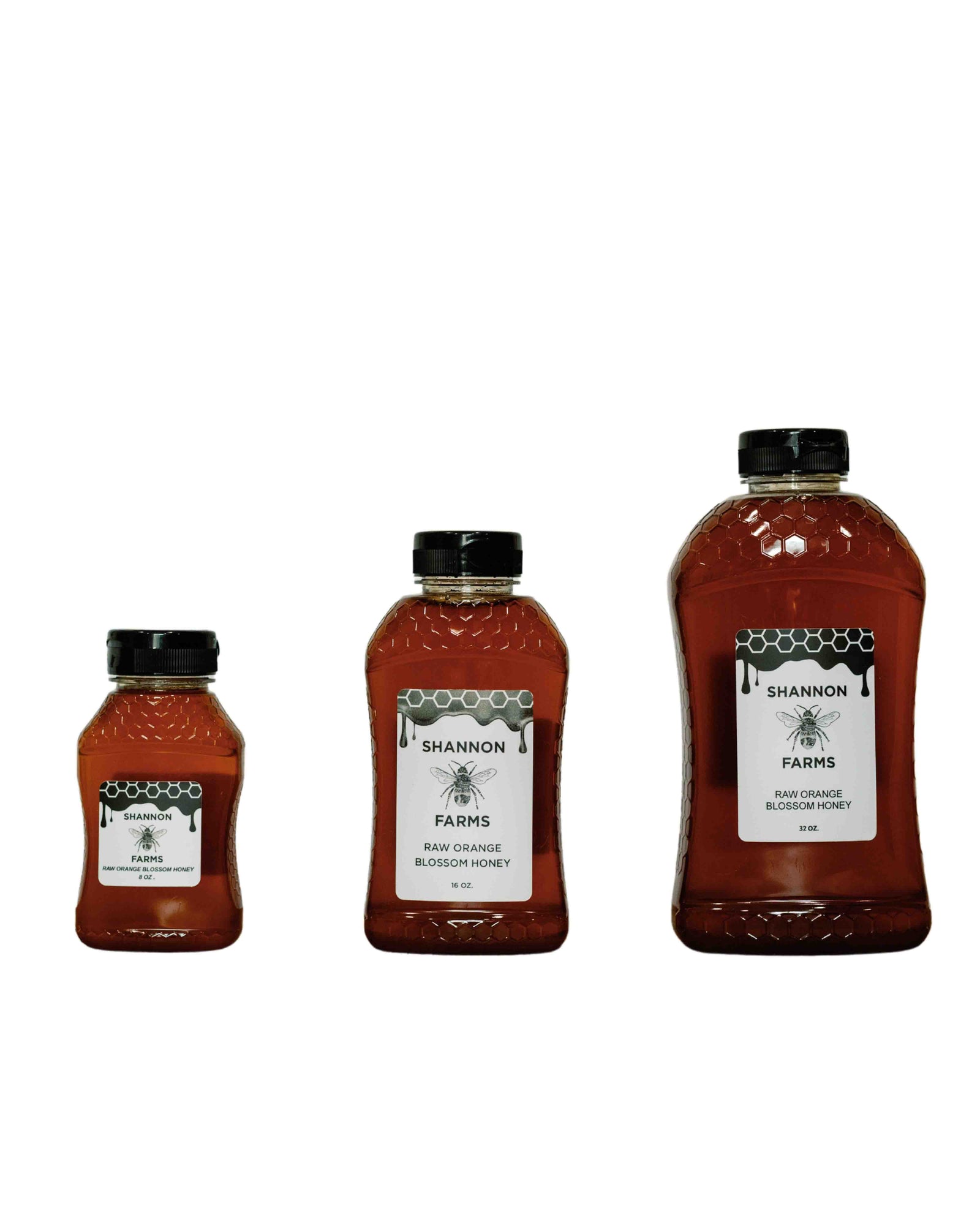 Three sizes of Shannon Farms raw orange blossom honey in labeled bottles