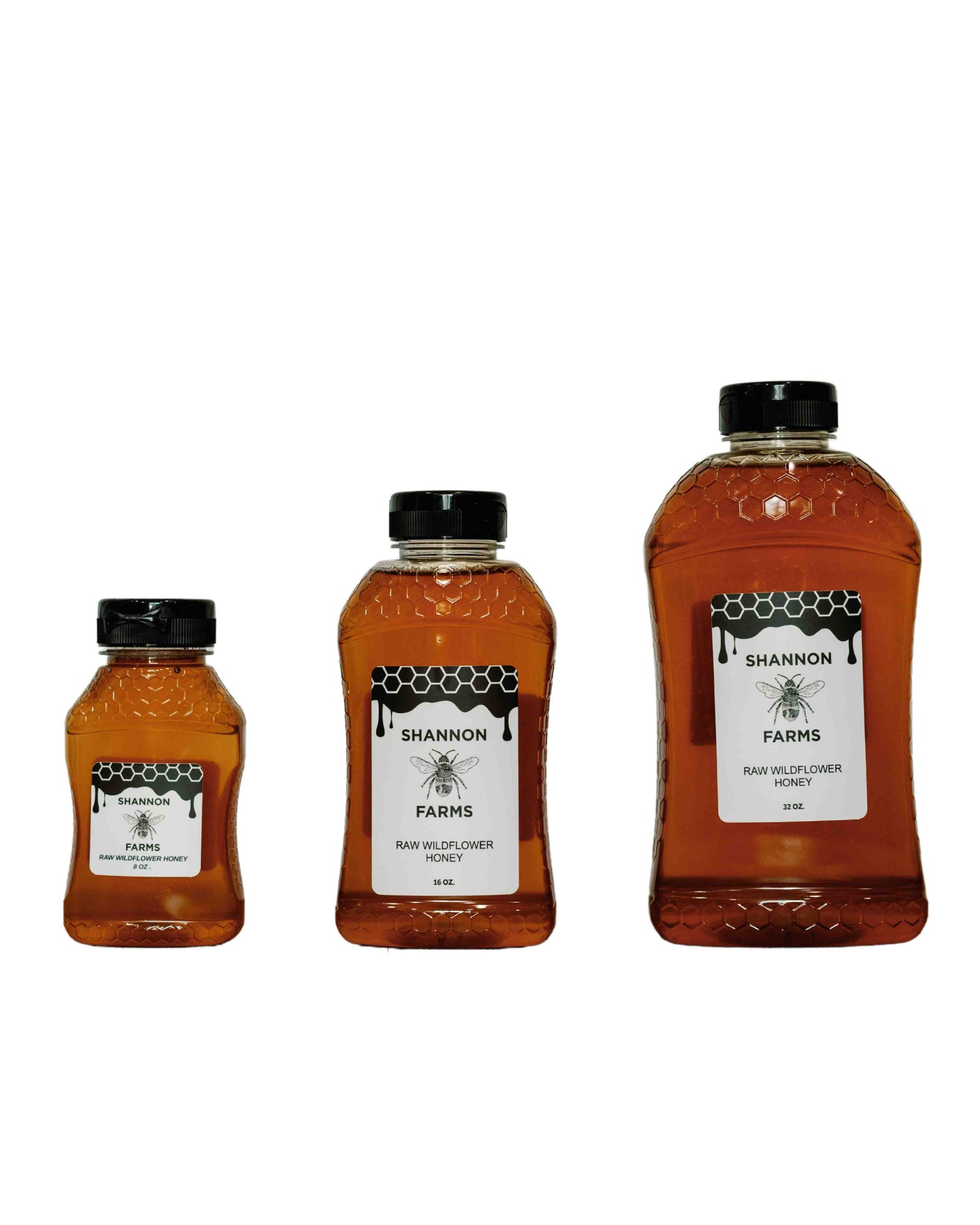 Three sizes of Shannon Farms raw wildflower honey in labeled bottles